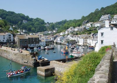 very very large boat entering polperro harbour